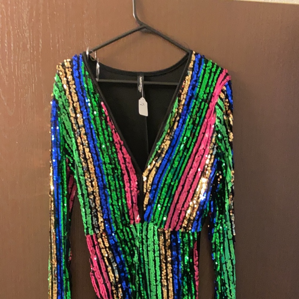 Sequence bodysuit see thru in the front runs small